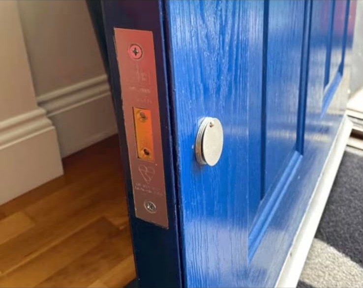 British Standard kitemarked lock plate fitted to a blue front door in London