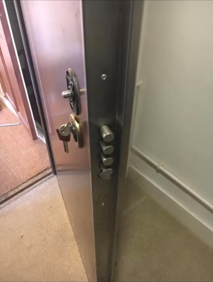 Reinforced steel security door fitted during a London security upgrade