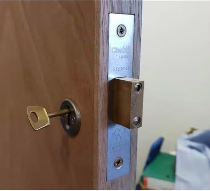 Five lever British Standard mortice deadlock fitted to a timber door in London
