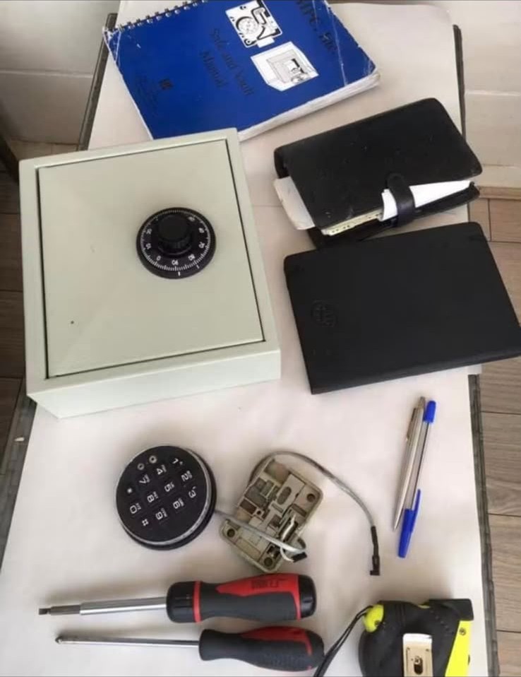 Specialist safe opening tools laid out on a London safe engineering job